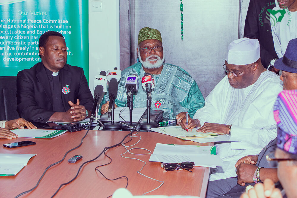 His Excellency, Alhaji Atiku Abubakar, the Presidential Candidate of the Peoples Democratic Party pen his signature to the 2019 National Peace Accord.